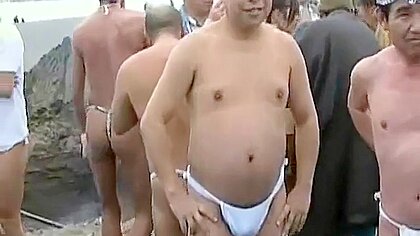 Japanese Bodybuilder Exhibiting At Matsuri On Public Beach